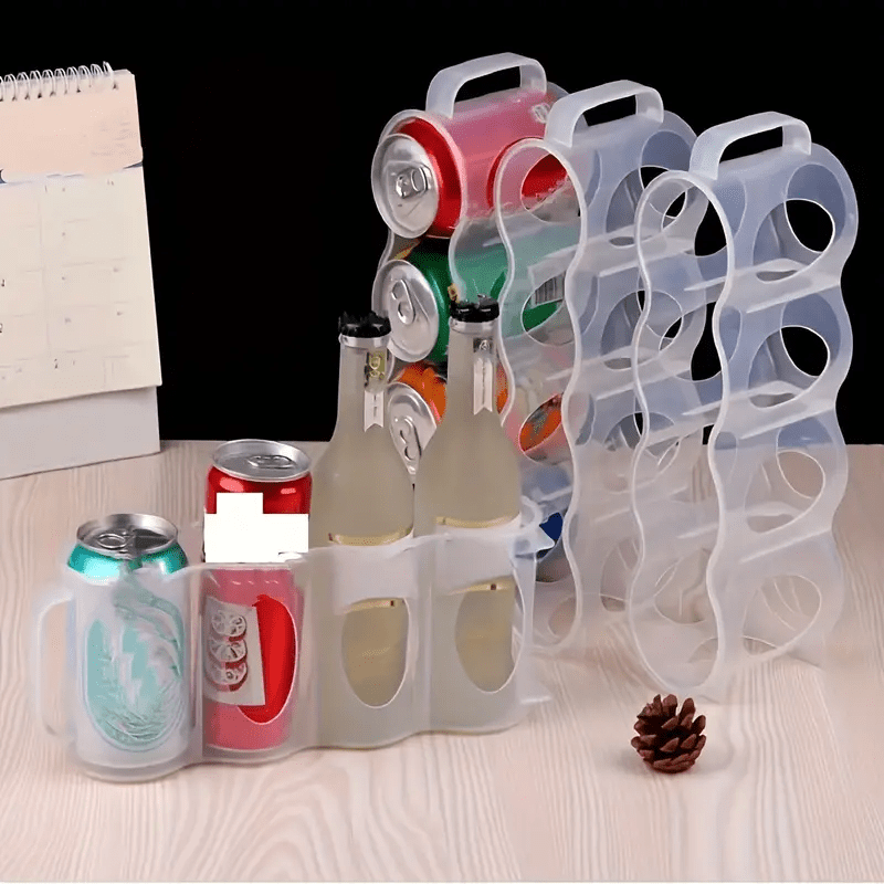 Clear plastic storage box with 4 compartments for soda cans, ideal for organizing your kitchen countertops, cabinets, and refrigerator. A convenient and portable solution for keeping your kitchen organized.