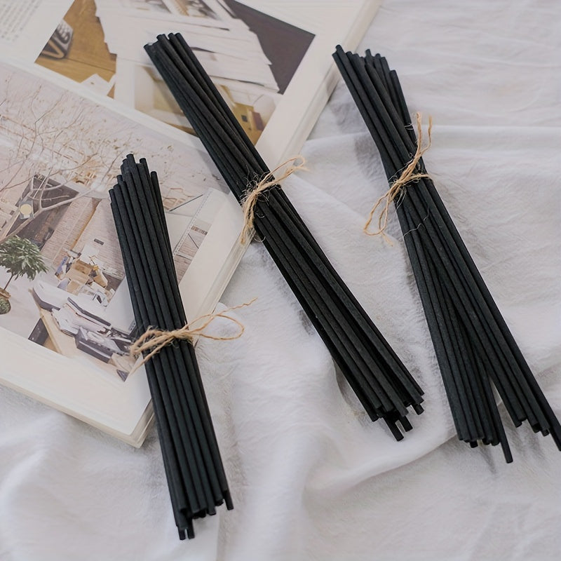 25 elegant fireless rattan reed diffuser sticks with black labels and golden cap for home decor and relaxation.