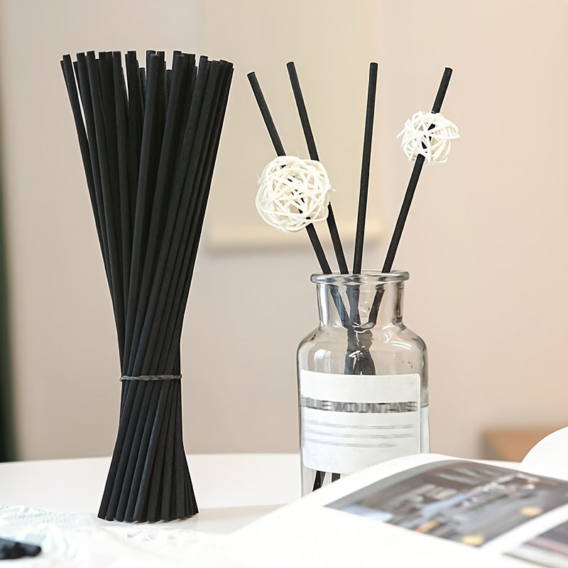 25 elegant fireless rattan reed diffuser sticks with black labels and golden cap for home decor and relaxation.