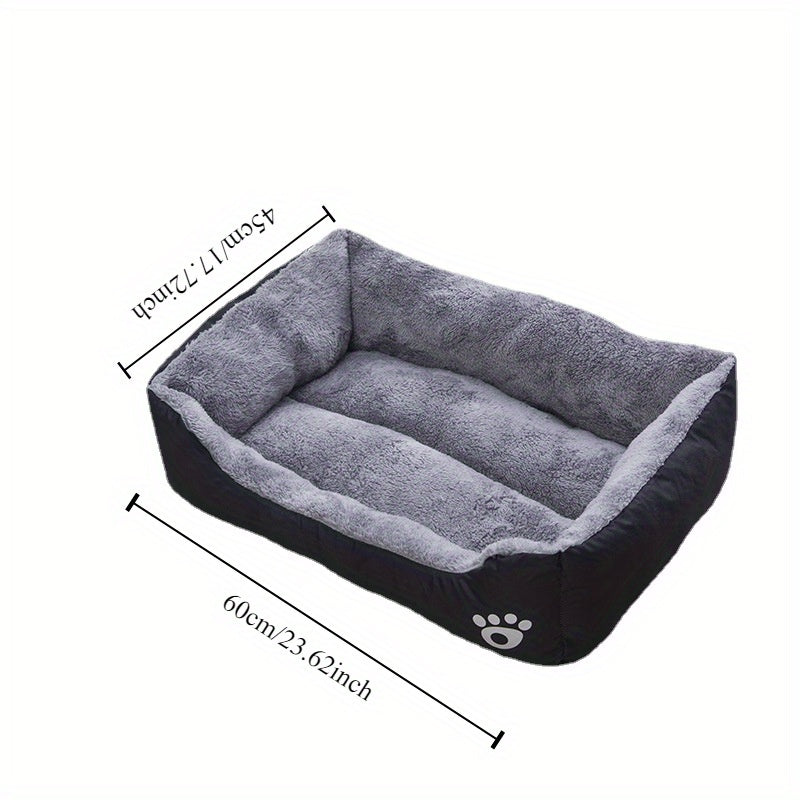 Soft plush pet bed for small to medium dogs, featuring paw prints design, cozy and washable.