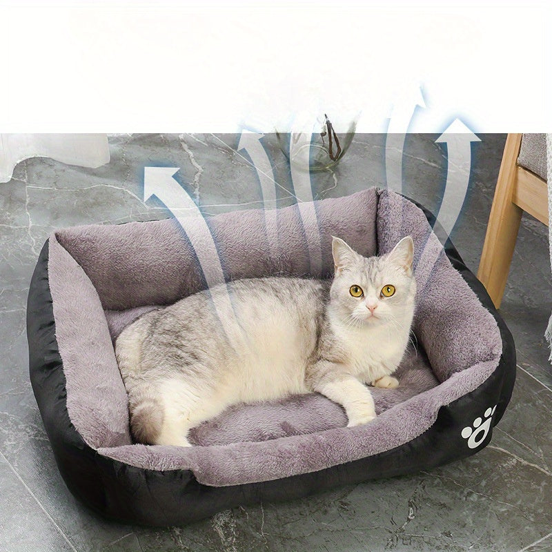 Soft plush pet bed for small to medium dogs, featuring paw prints design, cozy and washable.