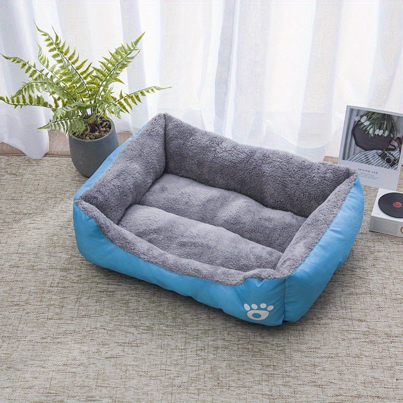 Soft plush pet bed for small to medium dogs, featuring paw prints design, cozy and washable.