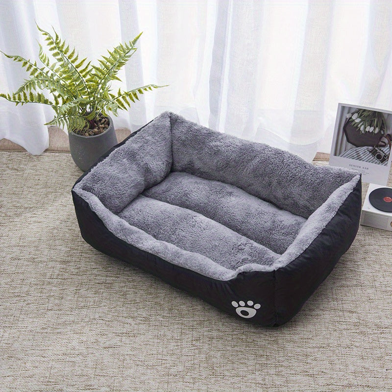 Soft plush pet bed for small to medium dogs, featuring paw prints design, cozy and washable.