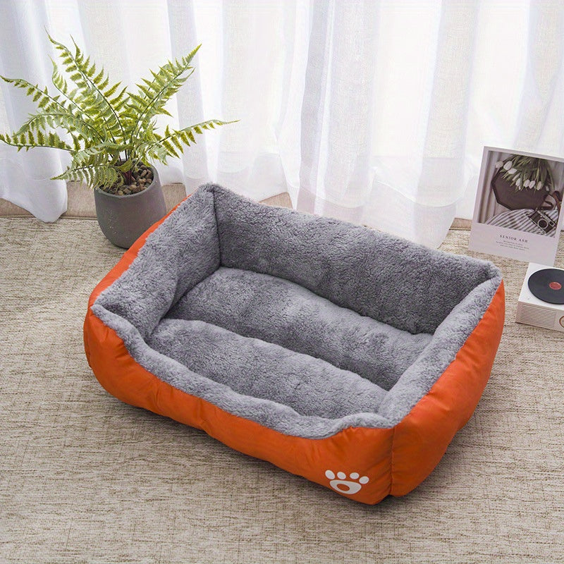 Soft plush pet bed for small to medium dogs, featuring paw prints design, cozy and washable.