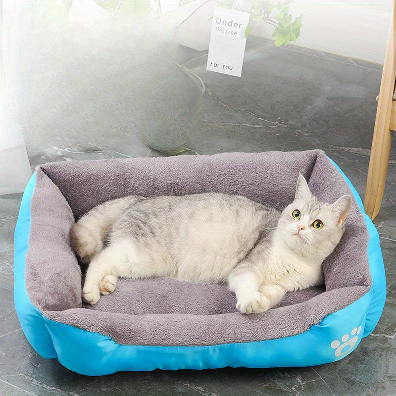 Soft plush pet bed for small to medium dogs, featuring paw prints design, cozy and washable.