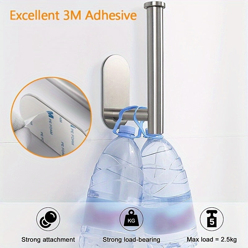 Self-adhesive stainless steel toilet paper holder for easy installation on walls, rust-proof and durable.