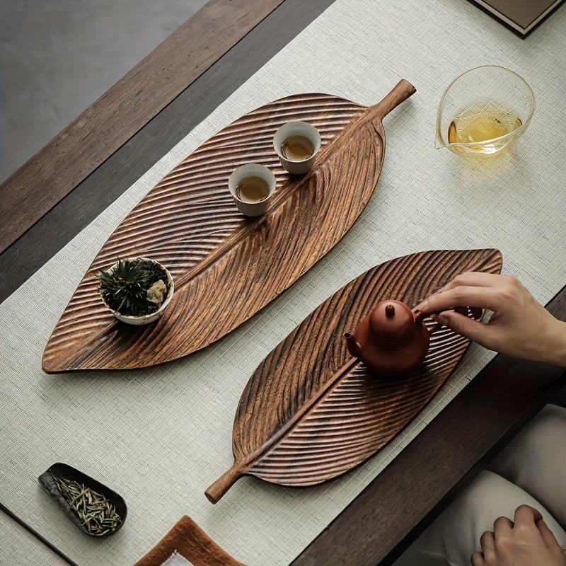 Wood leaf shaped serving tray for breakfast, dessert, bread, snacks, and sushi. Multipurpose and durable for home or commercial use. Ideal for kitchen and table decoration.