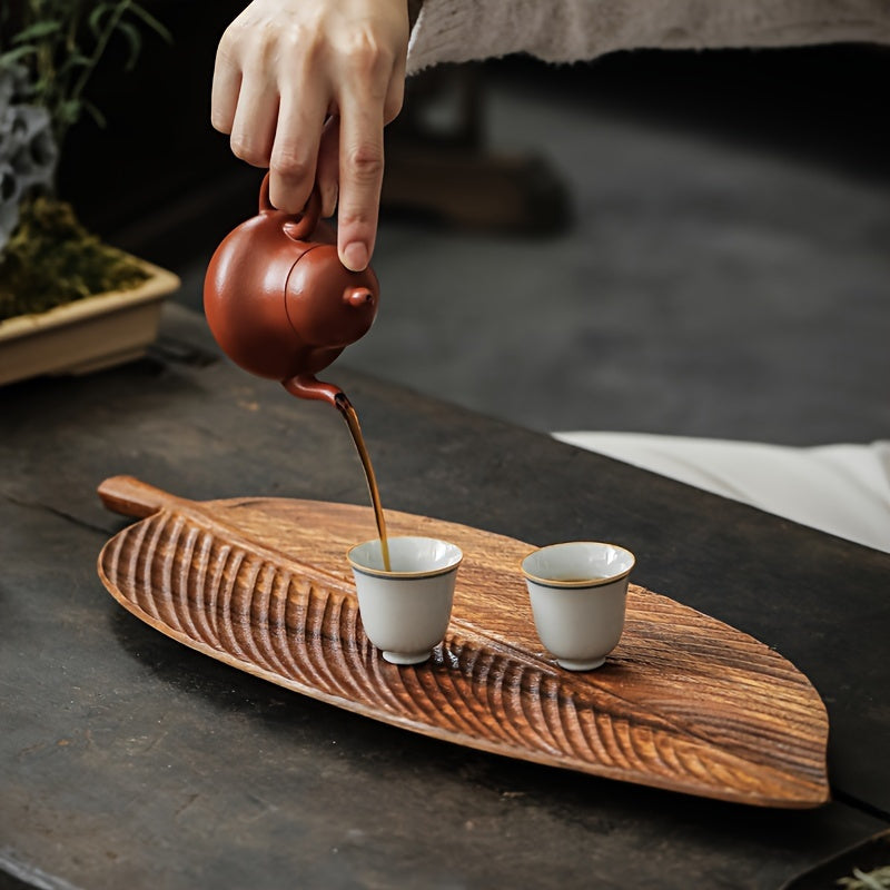 Wood leaf shaped serving tray for breakfast, dessert, bread, snacks, and sushi. Multipurpose and durable for home or commercial use. Ideal for kitchen and table decoration.