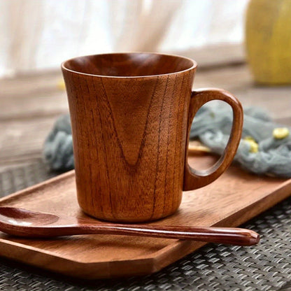 Japanese-style jujube wooden mug, heat-resistant for tea, coffee, beer, and home use; stylish drinkware made from wood.