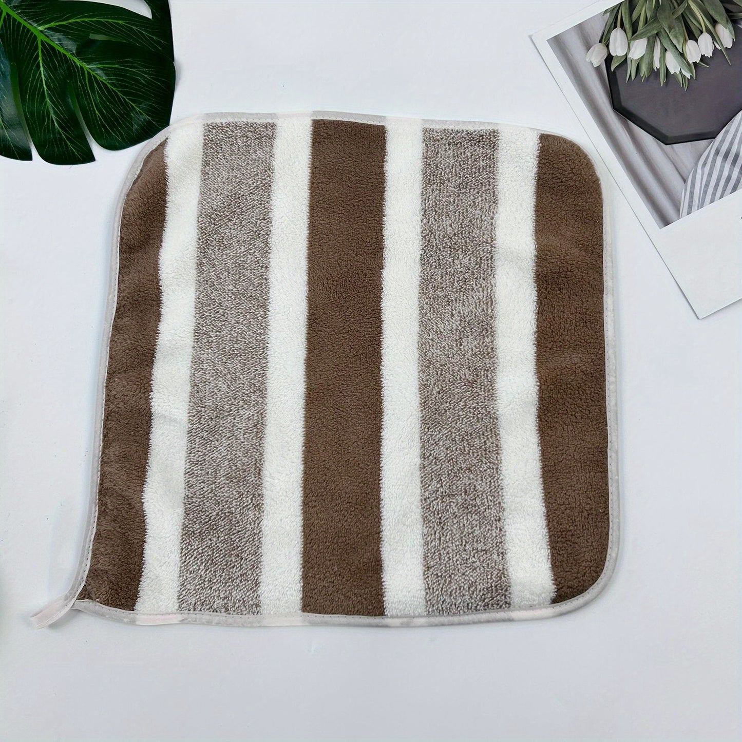 Soft, absorbent microfiber washcloth with contemporary striped design. Made of 100% polyester, lightweight and perfect for home bathroom cleaning.