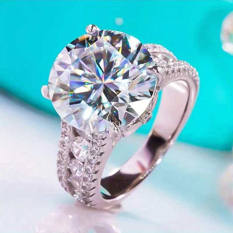 Luxurious Vintage-style S925 Sterling Silver Moissanite Engagement Ring with 10ct stone, perfect for both Men and Women. This Halo ring features a unique and exquisite design, making it an elegant gift for proposals, weddings, dinner parties, and other