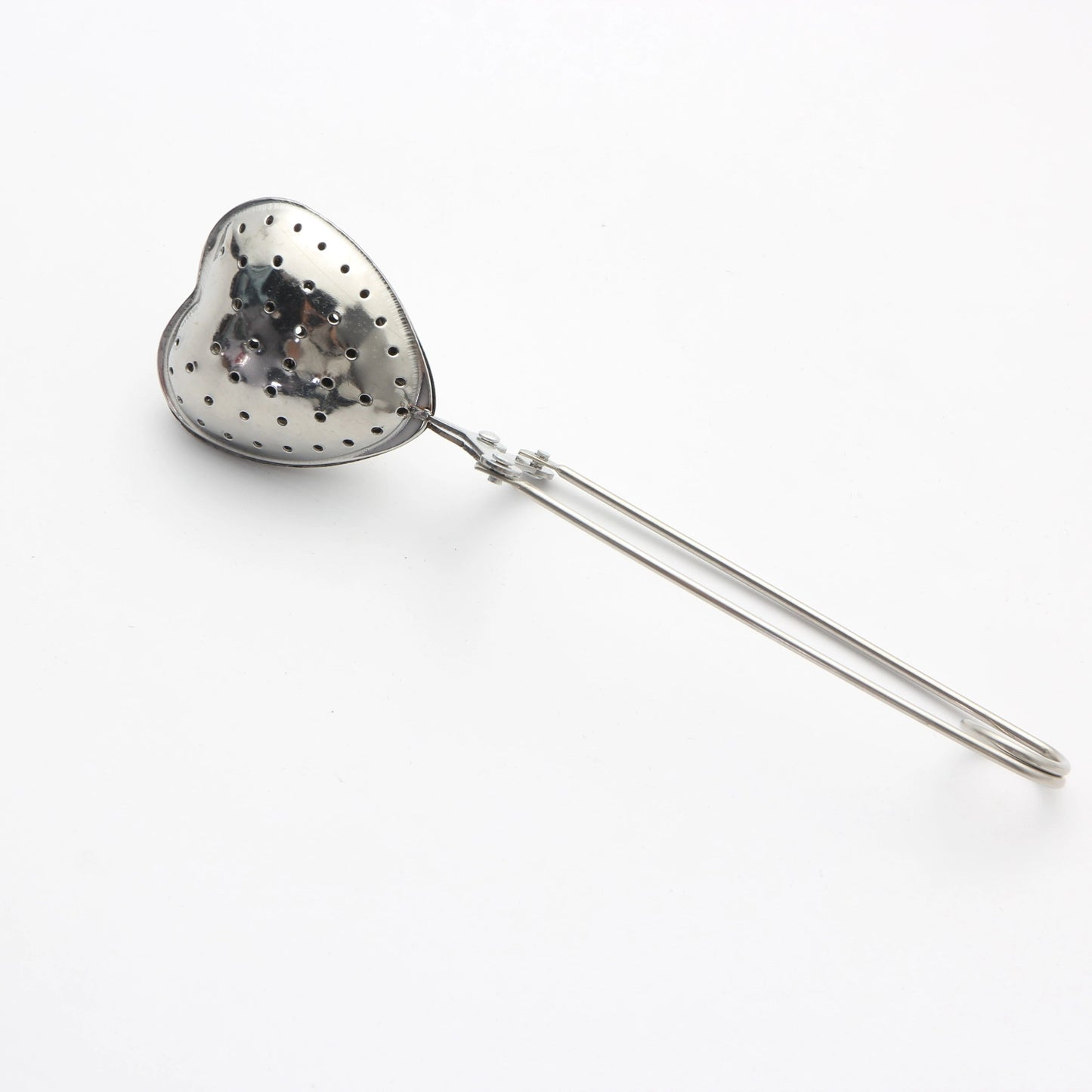 Heart-shaped stainless steel tea infuser with long handle, perfect for steeping loose leaf or herbal tea in the comfort of your home, restaurant, hotel, or office. A versatile tea accessory for your teaware collection.