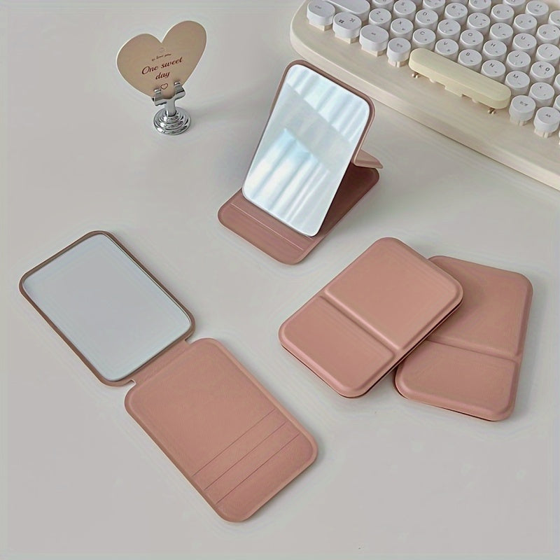 Portable handheld mirror for women in trendy fashion style.