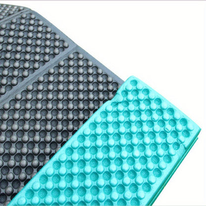 Single-person camping foam sleeping mat with portable folding design, moisture-proof features, and egg slot design. No repair kit or stuff sack included.