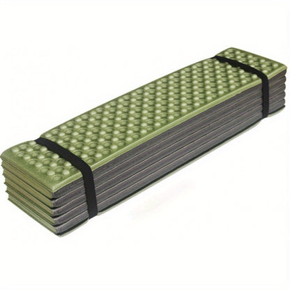 Single-person camping foam sleeping mat with portable folding design, moisture-proof features, and egg slot design. No repair kit or stuff sack included.