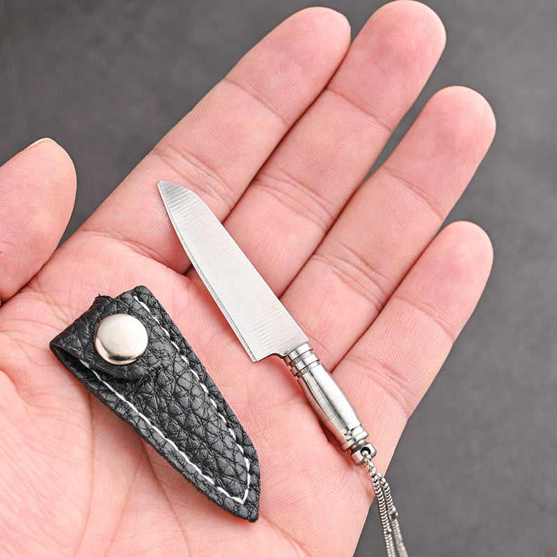 Mini keychain knife made of stainless steel - a portable, handmade novelty tool perfect for outdoor activities such as camping and fishing.