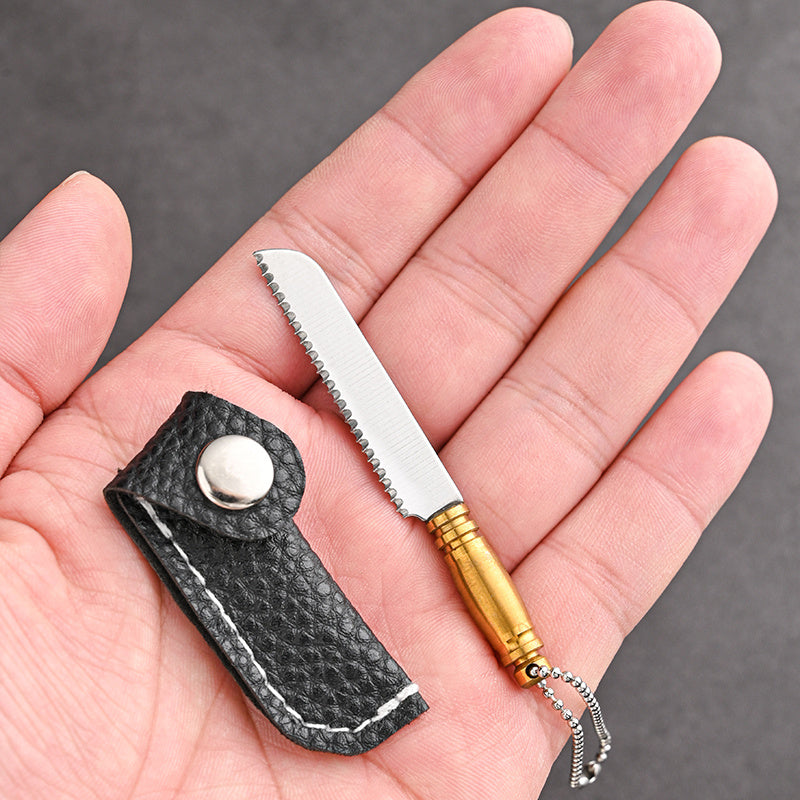 Mini keychain knife made of stainless steel - a portable, handmade novelty tool perfect for outdoor activities such as camping and fishing.