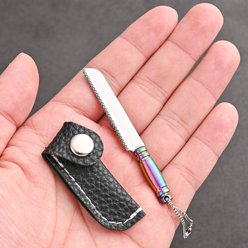 Mini keychain knife made of stainless steel - a portable, handmade novelty tool perfect for outdoor activities such as camping and fishing.