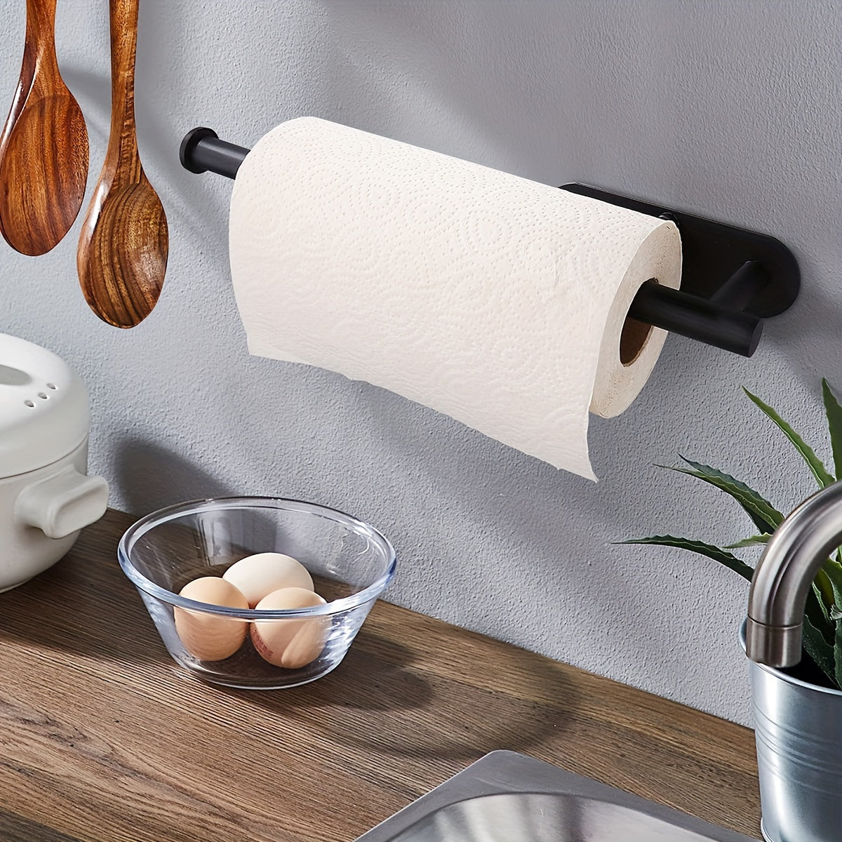 Wall-mounted paper towel holder made of stainless steel - Easily attachable, convenient organizer for multiple rolls in the kitchen or bathroom.