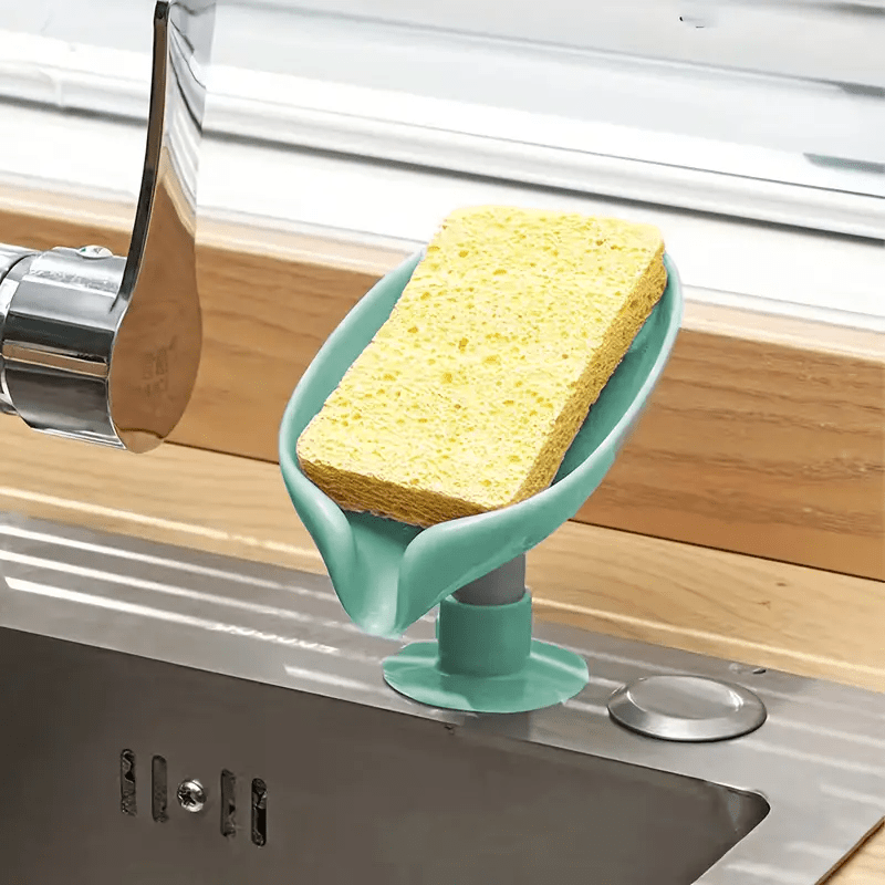 Plastic leaf-shaped soap holder with standing suction cup design, no punching needed. Water-resistant soap dish for bathroom.