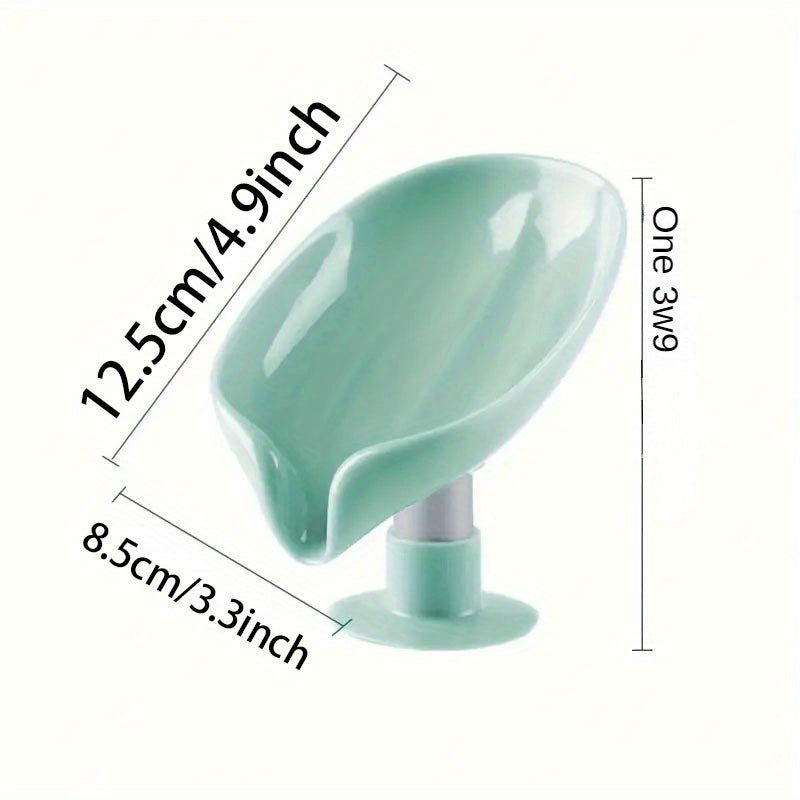 Plastic leaf-shaped soap holder with standing suction cup design, no punching needed. Water-resistant soap dish for bathroom.