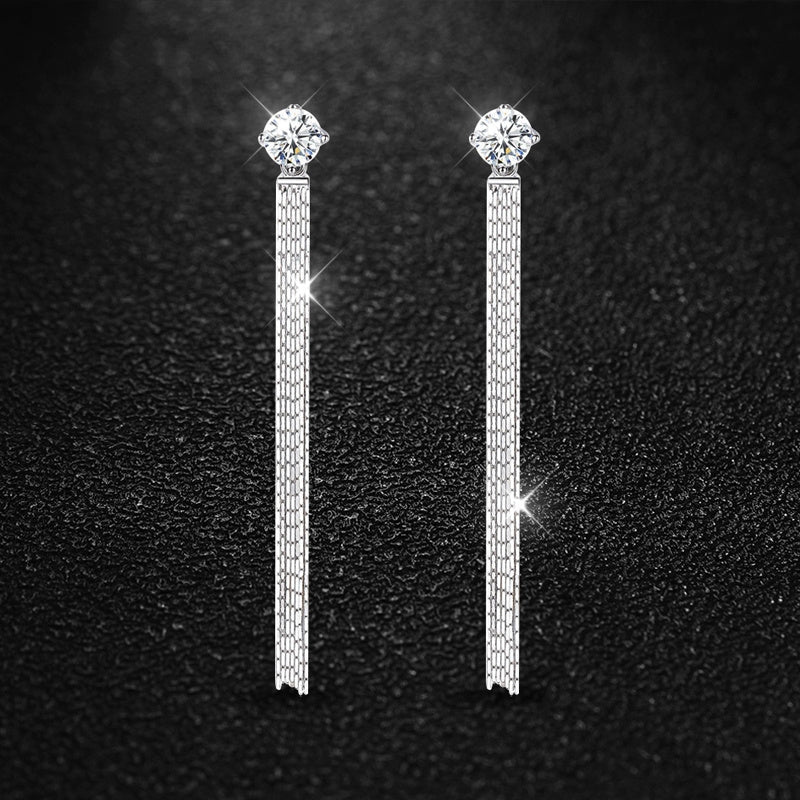 These 925 Sterling Silver stud earrings feature a total of 2 carats of Moissanite stones in a tassel design. They exude a Korean version of simple, yet trendy style, perfect for both men and women. The high-end and creative design showcases a lively and