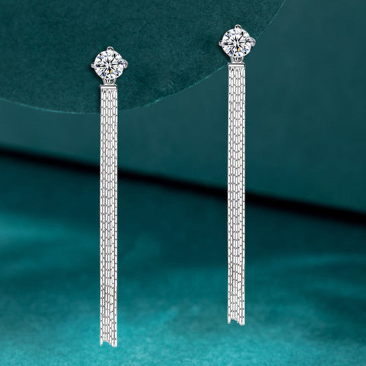 These 925 Sterling Silver stud earrings feature a total of 2 carats of Moissanite stones in a tassel design. They exude a Korean version of simple, yet trendy style, perfect for both men and women. The high-end and creative design showcases a lively and