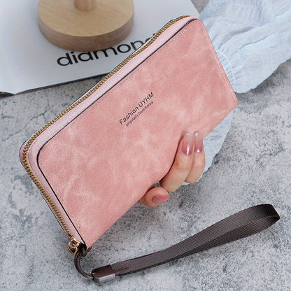 Women's long wallet with multi-function card holder, phone pocket, wrist strap, and made of PU leather.