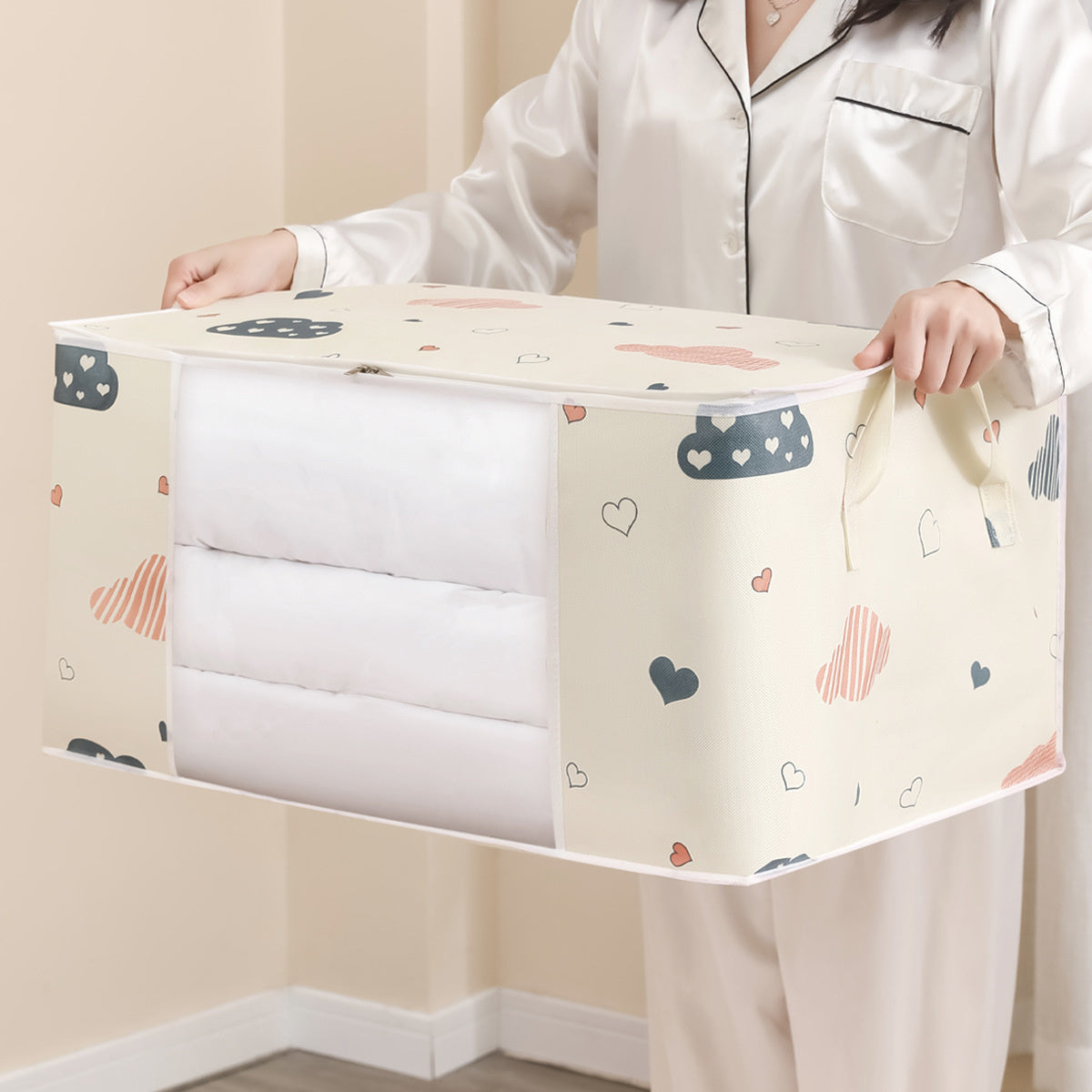 Extra Large Capacity Storage Bag 
- Features a clear window
- Made of durable fabric
- Moisture-proof
- Foldable design for easy storage
- Can be used as a clothes or quilt organizer
- Reinforced handles for added strength
- Helps keep your home wardrobe