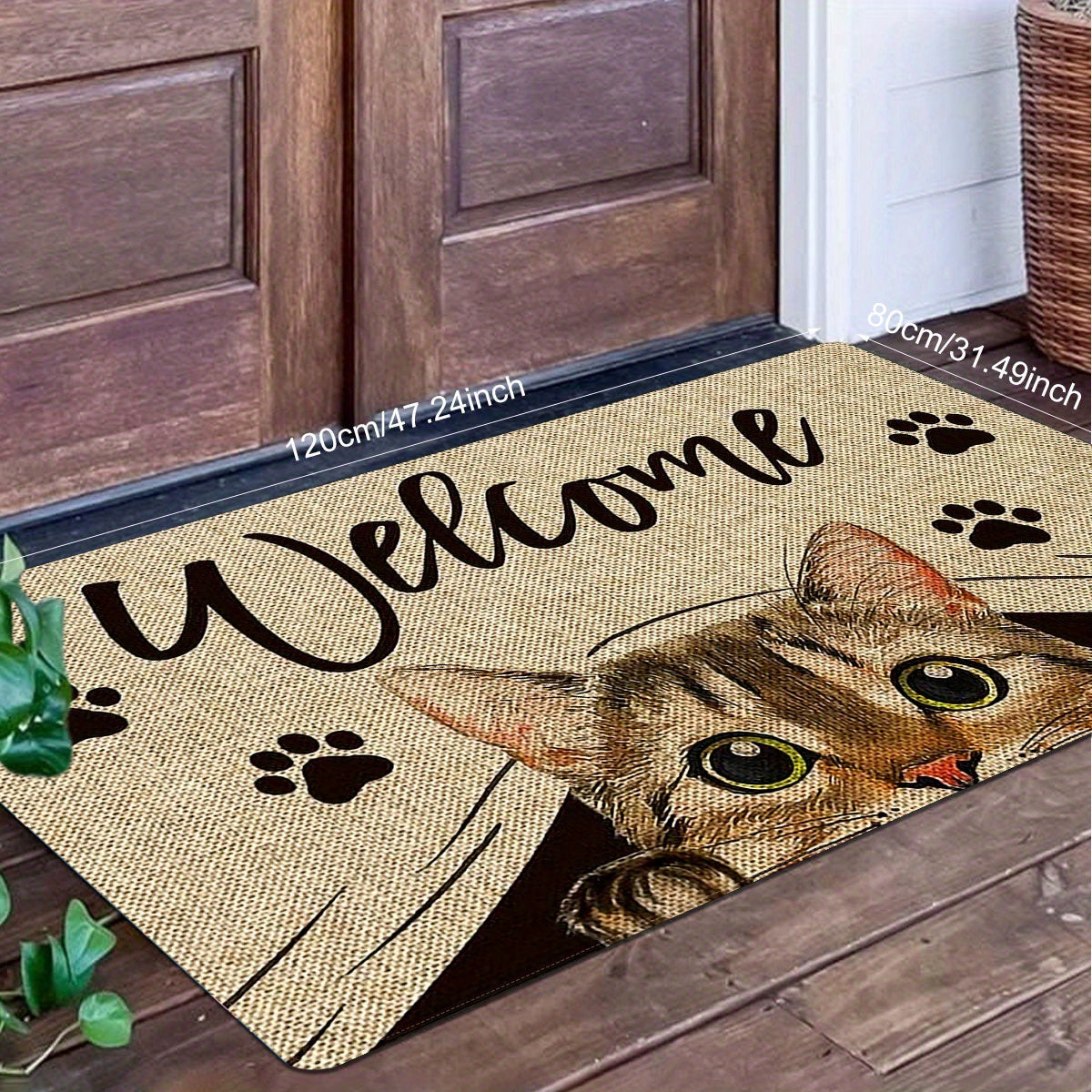 One piece of polyester entrance area floor mat featuring a printed pattern with cat elements and "Welcome Home" text. This non-slip, stain-resistant soft floor mat is suitable for indoor or outdoor use, including as a quick dry kitchen mat. Perfect for