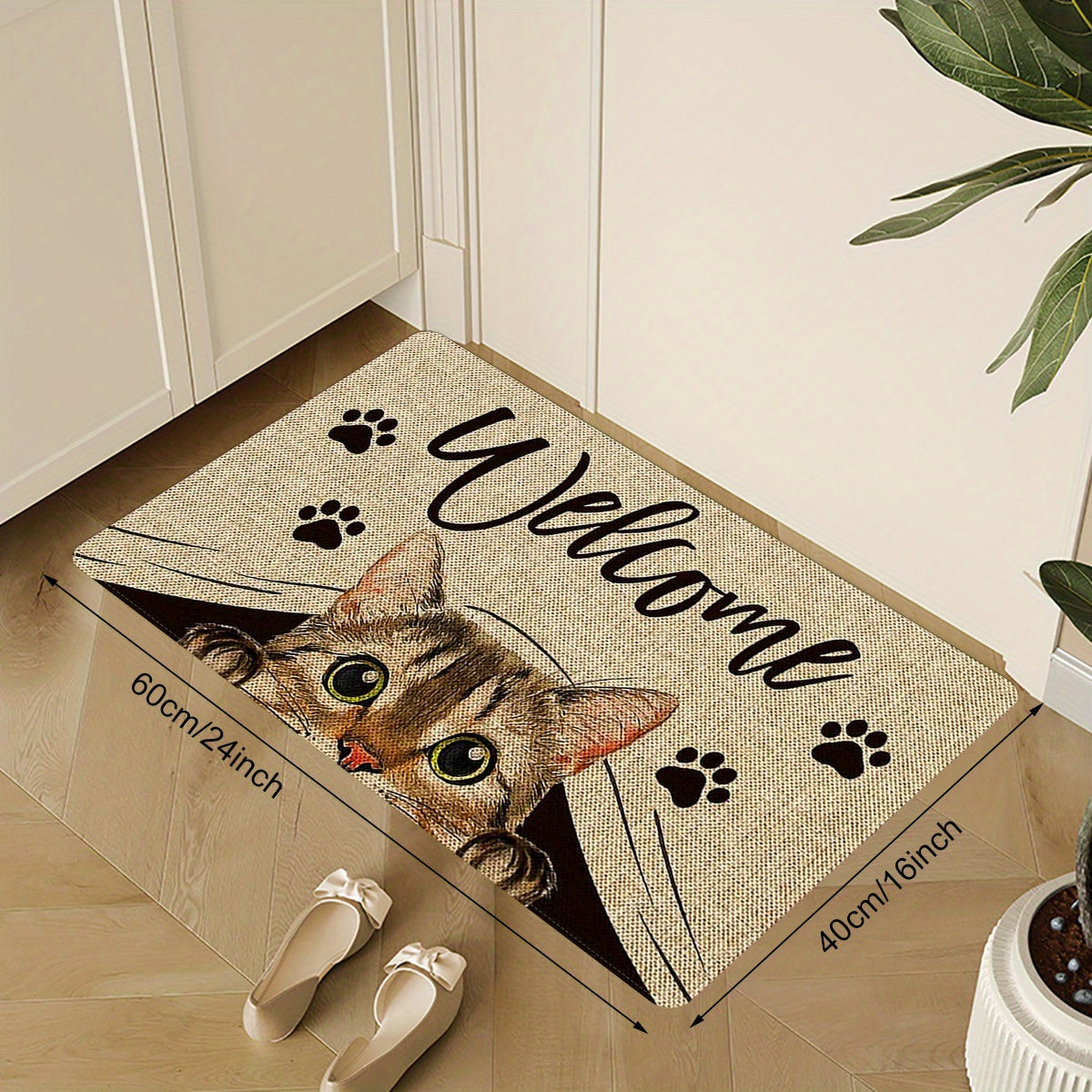 One piece of polyester entrance area floor mat featuring a printed pattern with cat elements and "Welcome Home" text. This non-slip, stain-resistant soft floor mat is suitable for indoor or outdoor use, including as a quick dry kitchen mat. Perfect for