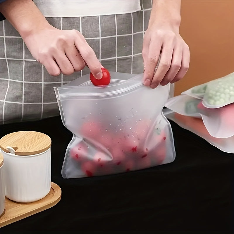 Two reusable silicone food storage bags that are leakproof and BPA-free. These ziplock pouches are ideal for storing fruits, vegetables, sandwiches, and meats. They are perfect for keeping your freezer and kitchen organized.