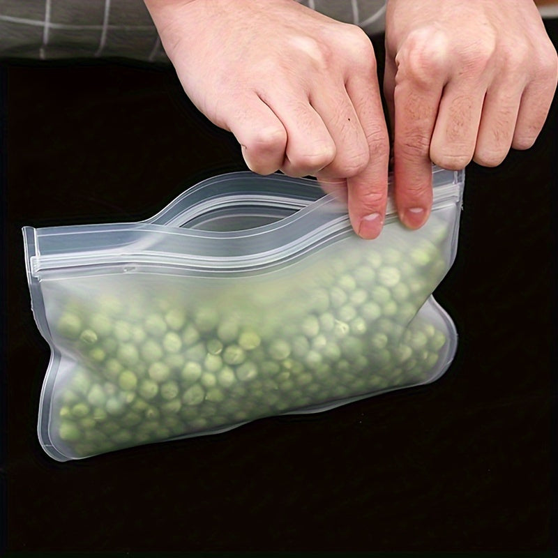 Two reusable silicone food storage bags that are leakproof and BPA-free. These ziplock pouches are ideal for storing fruits, vegetables, sandwiches, and meats. They are perfect for keeping your freezer and kitchen organized.