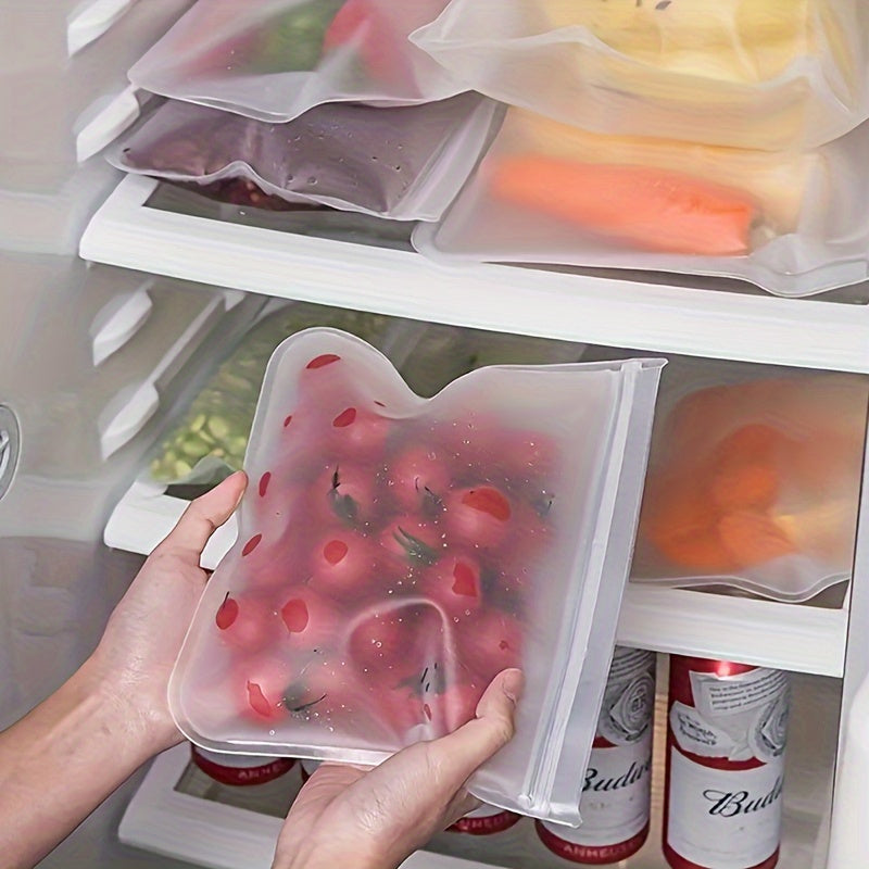 Two reusable silicone food storage bags that are leakproof and BPA-free. These ziplock pouches are ideal for storing fruits, vegetables, sandwiches, and meats. They are perfect for keeping your freezer and kitchen organized.