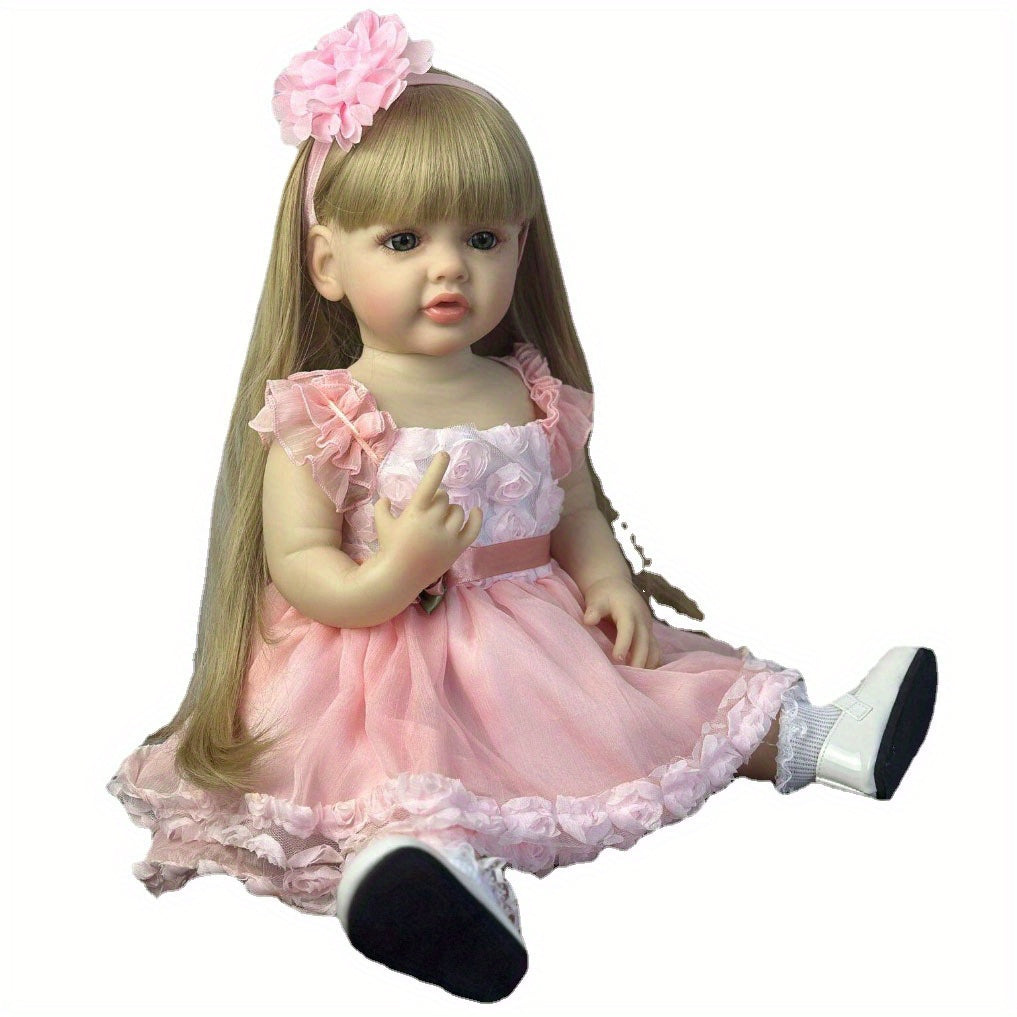 55.88cm Lifelike Princess Youngsters Girl Reborn Doll with soft silicone body, pink dress, long blonde wig, ideal gift for youngsters and collectors.