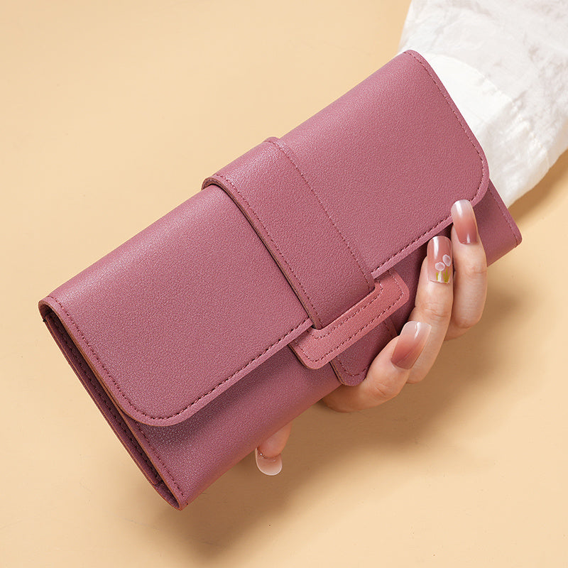 Stylish women's long wallet with multiple card slots and coin purse, features a chic buckle clutch for mobile phone.