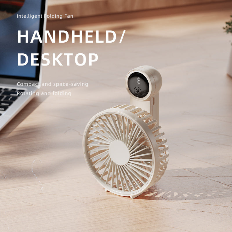 Small handheld USB fan with adjustable speeds, digital display, and long-lasting battery life - perfect for keeping cool on the go, at work, or during outdoor adventures. Makes a great gift!