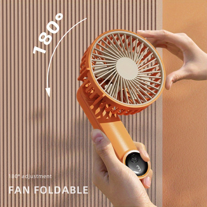 Small handheld USB fan with adjustable speeds, digital display, and long-lasting battery life - perfect for keeping cool on the go, at work, or during outdoor adventures. Makes a great gift!