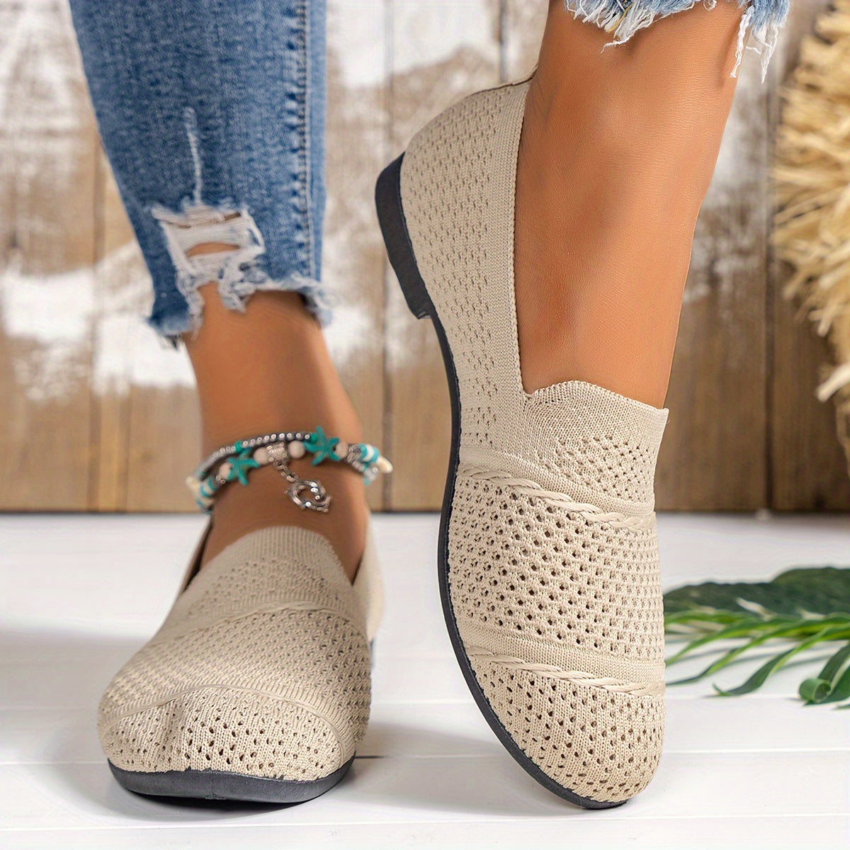 Comfortable beige knit slip-on loafers for women, perfect for all seasons.