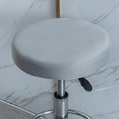 Stretchy round slipcover for bar stool, protecting furniture in dining, living, or office areas.