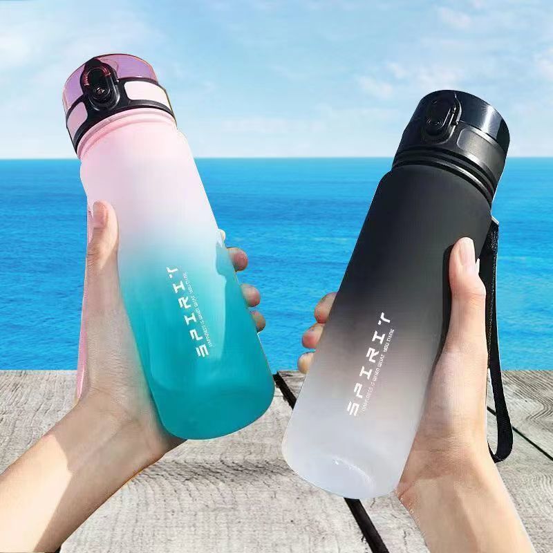 Gradient sports water bottle with easy-flip top for active lifestyles.