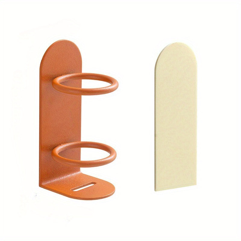 Wall-mounted iron toothbrush holder with drainage, available in white, orange, and black. This space-saving storage rack does not require drilling and is perfect for bathroom organization.