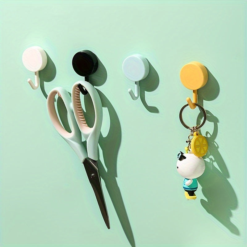 Ten self-adhesive wall hooks in a contemporary style that do not require electricity. These strong hangers are perfect for bedroom, bathroom, and kitchen use. They have a polished finish and are easy to install.