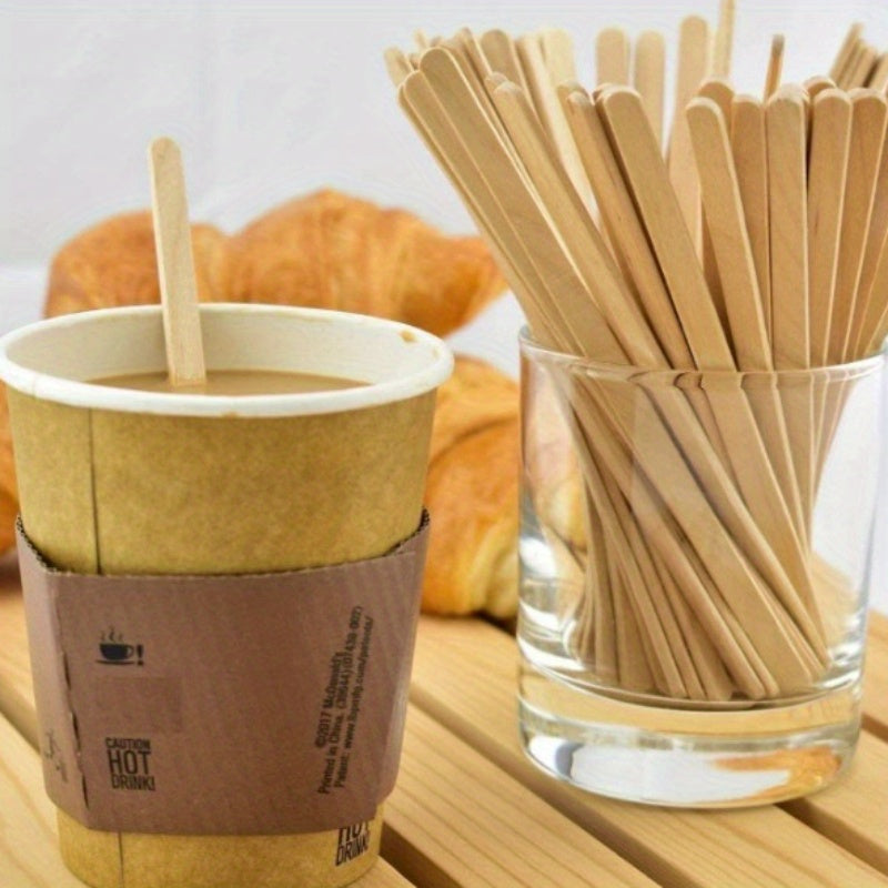 100 pieces of high-quality disposable wooden coffee stirrers with a round end for smooth mixing.