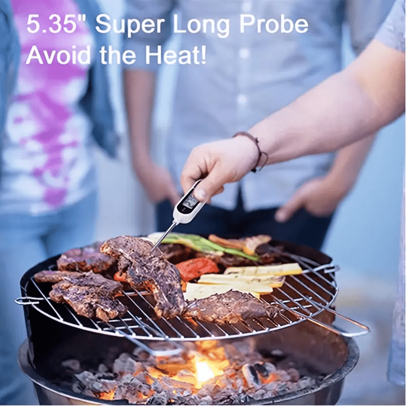 Stainless steel digital food thermometer TP300 with probe, ideal for BBQ, cooking, and baking. Dual display in Celsius & Fahrenheit, battery-operated kitchen tool.