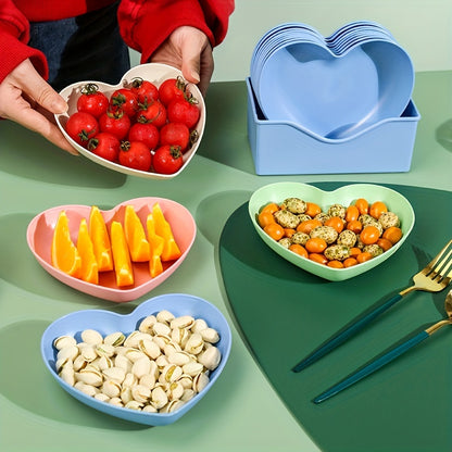 5-piece set of heart-shaped plastic snack dishes with storage box, perfect for serving fruit, desserts, and cake in the kitchen.