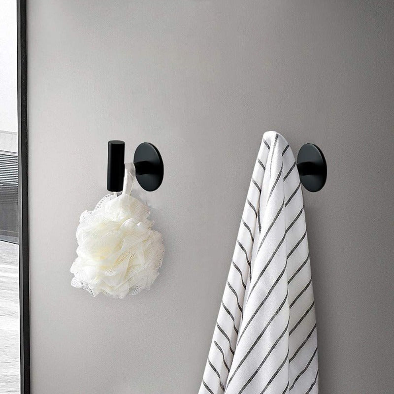 Stainless steel bathroom hook for hanging clothes.