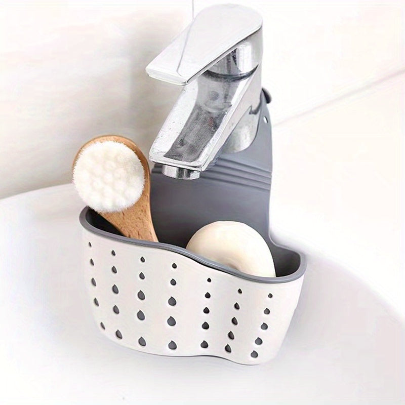 Adjustable silicone sink caddy for sponges and supplies, no batteries required.