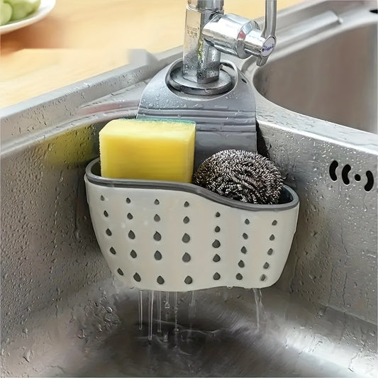 Adjustable silicone sink caddy for sponges and supplies, no batteries required.