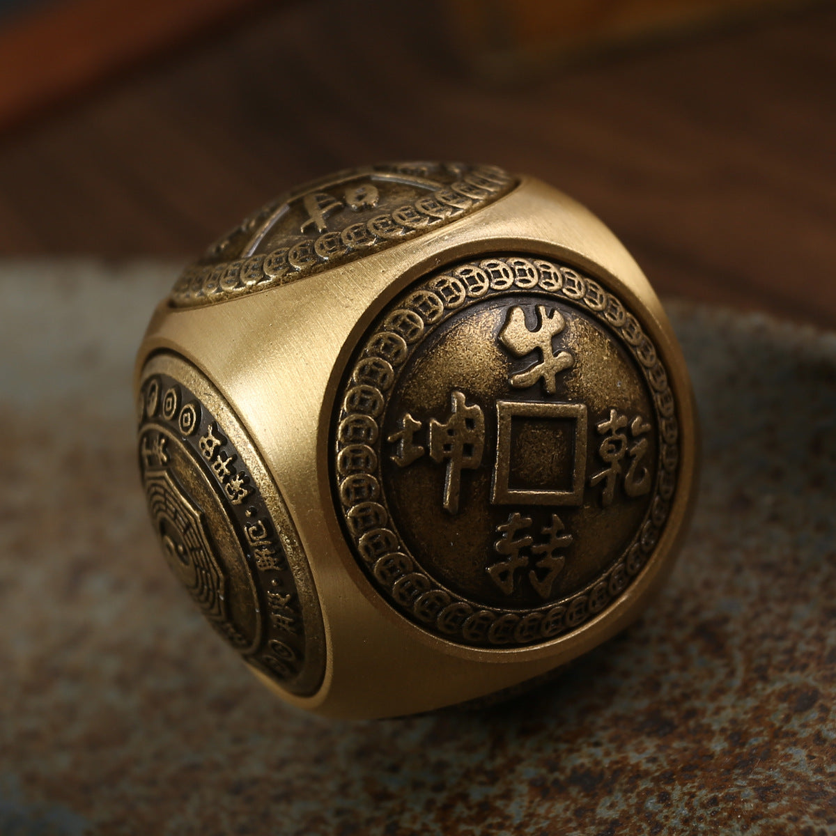 Brass stress relief sphere for prosperity and good fortune.